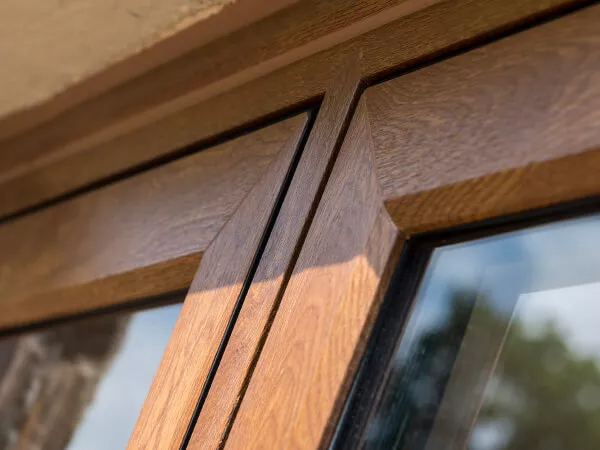 A close-up of a flush casement window frame