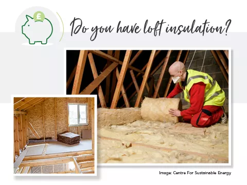 A man installing loft insulation