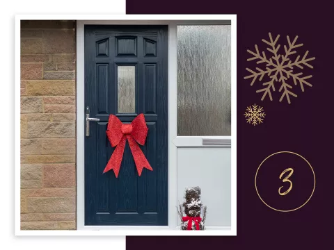 A red bow on a front door